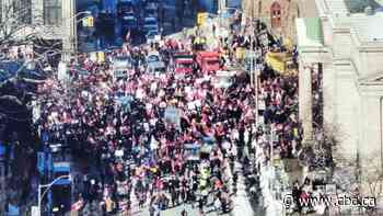 Trucks block major intersection in Toronto as part of demonstration against vaccine mandates