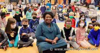 Stacey Abrams Camp Blames GOP After Pic of Failed Candidate Smiling Around Kids Forced to Wear Masks Goes Viral