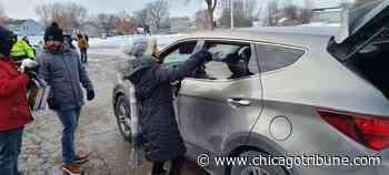 Food pantry's pop-up event in Aurora focuses on children because families have been 'hit hard during the pandemic' - Chicago Tribune
