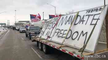 Protesters block traffic in both directions on Ambassador Bridge linking Detroit to Windsor