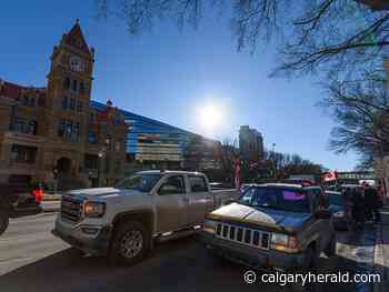 Police issue about 80 tickets as convoys snarl traffic in Calgary - Calgary Herald