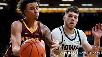 Iowa rides big second half to down Gophers 71-59