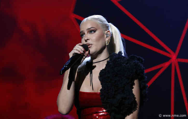Anne-Marie reacts to BRITs 2022 onstage stumble: “Didn’t need my left ankle anyway”