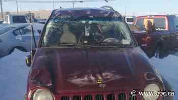 Saskatoon woman's Jeep winds up upside down after hitting snow ridge on University Bridge - CBC.ca
