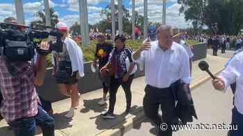 Activist who demanded Scott Morrison be sent 'to the gallows' escorted into Parliament House by Craig Kelly - ABC News