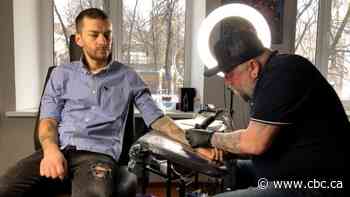 In Kyiv, Ukrainians resist the urge to panic in spite of massive Russian troop buildup