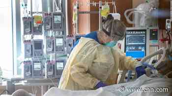 Covid hospitalizations drop below 100,000 in US