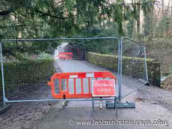 Towneley Park bridge and footpath cordoned off as heavy rain erodes foundations