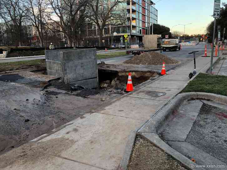 Water main break causes large hole on West Riverside Drive