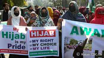 No religious clothes until hijab row settled, India court tells students
