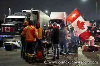 Protesters settle in at Ambassador Bridge border crossing, mayor wants injunction - Comox Valley Record