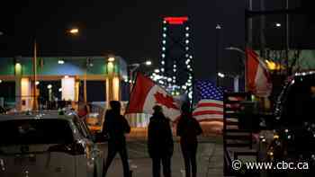 Protesters allow lane of traffic to open at Ambassador Bridge blockade