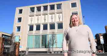 Readers grab armfuls of books as Grimsby Central Library finally reopens - Grimsby Live