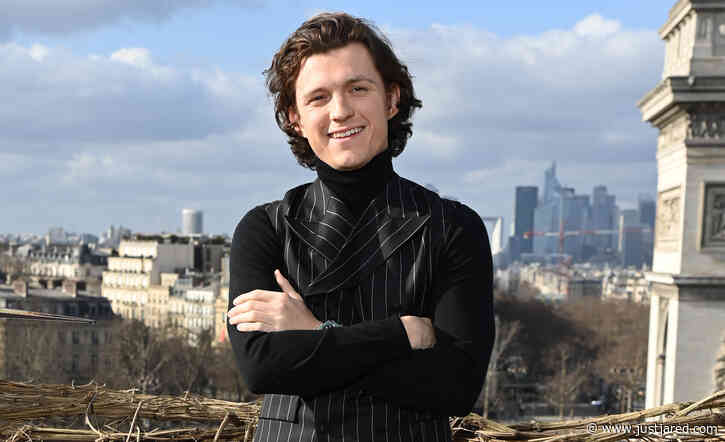 Tom Holland Goes For Pinstripes in Paris on Latest 'Uncharted' Tour Stop