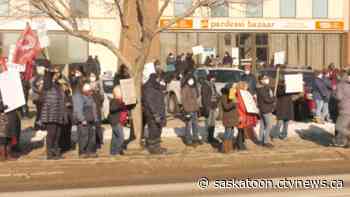 Protestors demonstrate outside Sask. health minister's office in response to restrictions lifting