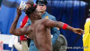 AB's glove from sideline meltdown sells for $16K