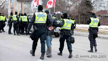 Protesters still blocking a US-Canada border crossing over Covid-19 mandates can face severe penalties, official says