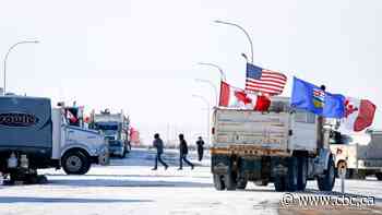 Mounties seize guns and arrest 13 protesters at border blockade in Alberta