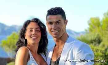Cristiano Ronaldo looks smitten as he poses with glamorous partner Georgina Rodriguez in sweet snap - Daily Mail