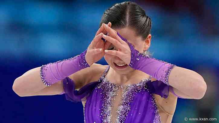 Emotional Valieva leads in figure skating amid doping scandal