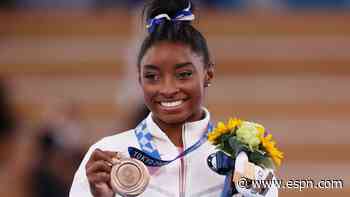 Diamonds and gold: Biles, NFL's Owens engaged