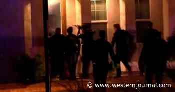 Officers Ambushed as They Rescue Infant During Armed Standoff: Nine Officers Hurt, But Baby's Alive
