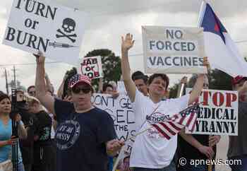 Unvaccinated medical workers turn to religious exemptions - Associated Press
