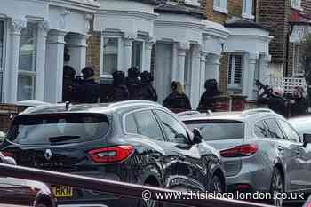 Dramatic pictures as armed police swoop Brockley house