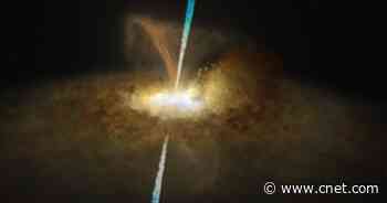 Scientists Catch Supermassive Black Hole Hiding Within Cosmic Halo     - CNET
