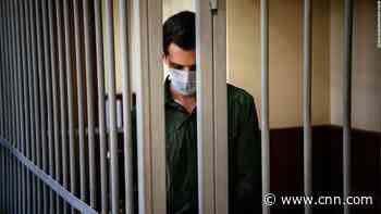 American detained in Russia says he is coughing up blood, has not received medical care