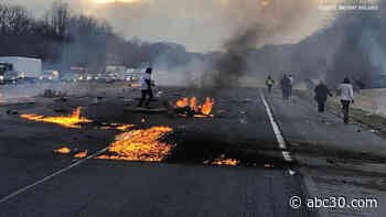Pilot killed when plane crashes into tractor-trailer on North Carolina highway