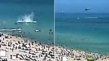 WATCH: Helicopter crashes near swimmers off coast of crowded Miami Beach; 2 injured but stable