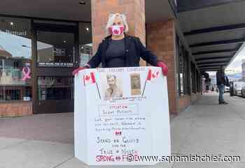BC woman holds counter-protest in downtown Kelowna - Squamish Chief