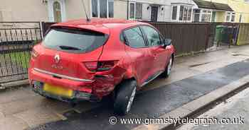 Grimsby man wakes up to car wedged in his fence after late night crash - Grimsby Live