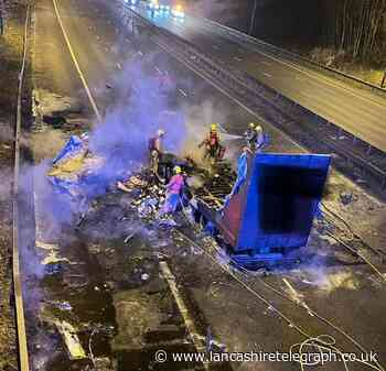 Truck bursts into flames on M6 after hitting bridge in high winds