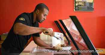 Culture shock, jerk chicken, and a food truck; Rexroy Scott tells the story of his immigration - Columbia Missourian