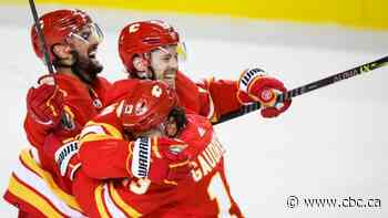 Lindholm's go-ahead goal leads scorching Flames past Jets for 10th consecutive victory