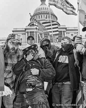 Arrested after a fatal stabbing, a Utah man told police he brought a gun to Capitol riot