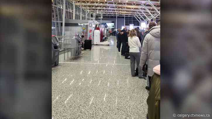 Significant delays at YYC Calgary International Airport due to systems outage