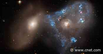 Hubble Spots Weird 'Space Triangle' Full of Baby Stars     - CNET