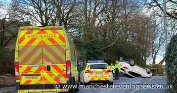 Woman rushed to hospital after car flips in dramatic Bolton crash - Manchester Evening News