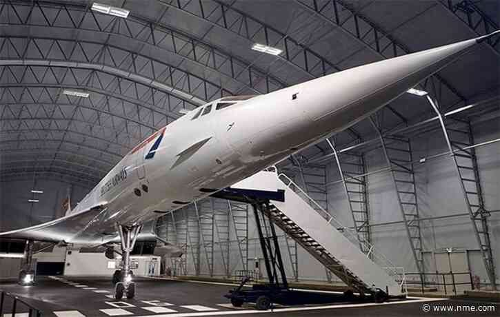 Rave underneath the wings of a Concorde at Manchester Airport