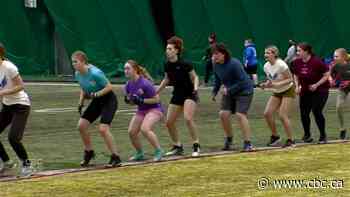 ‘I love hitting people’: Girls' tackle football gaining popularity
