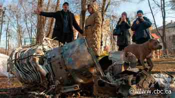 Some Ukrainians panic, others cling to routine as Russia attacks