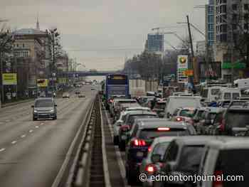 Edmonton joins others across Canada rallying to support Ukraine as Russia launches attacks