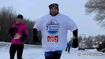 Edmonton man who ran a half marathon in 90 shirts says it took 'a lot of practice' - CBC.ca
