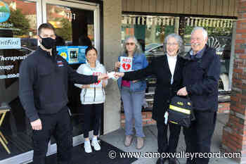 Comox Firefighters Association partners with building owners to add another AED in town - Comox Valley Record