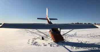 Pilot uninjured after small plane crashes on frozen lake in central Alberta