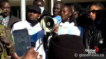 Protesters gather in downtown Calgary demanding justice for Latjor Tuel - Globalnews.ca