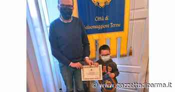 Premiato «Lollo», il bambino dei calzini spaiati - Gazzetta di Parma